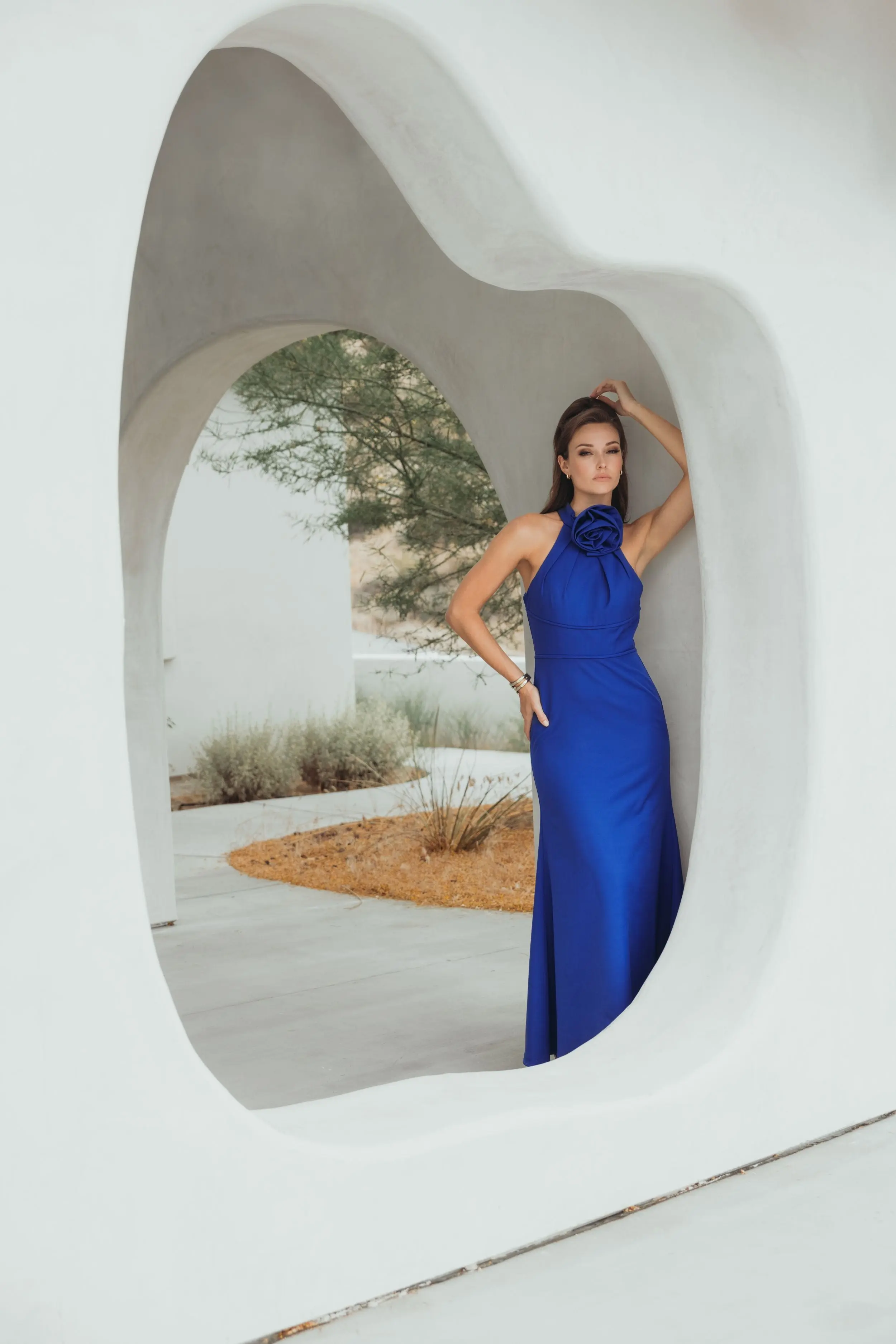 Blue Sleeveless Halter Neck Gown with Rosette Detail - Image 4